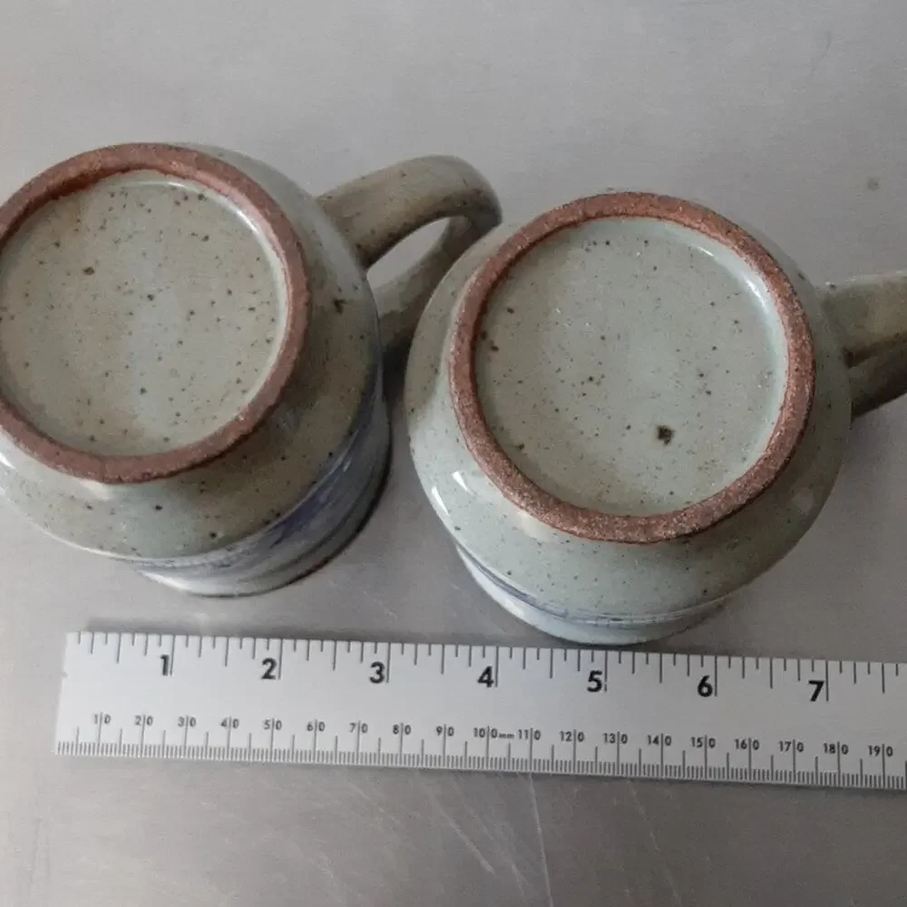 Handmade set of glazed pottery mugs